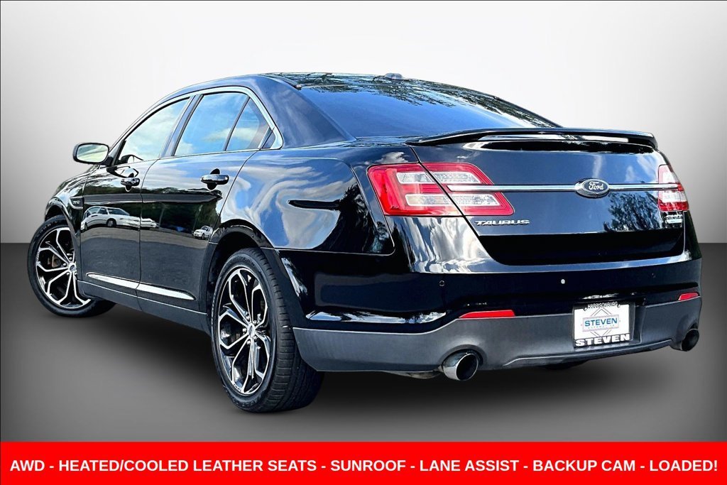 Used 2016 Black Ford SHO image 4