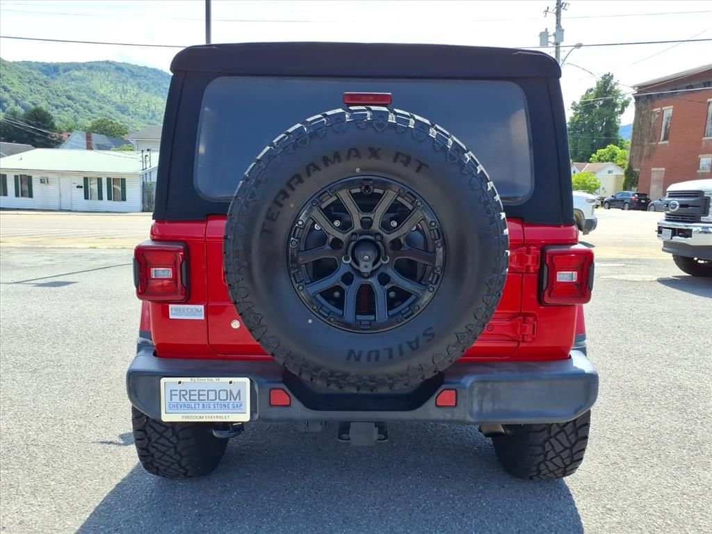 Used 2018 Red Jeep Unlimited Sahara image 4