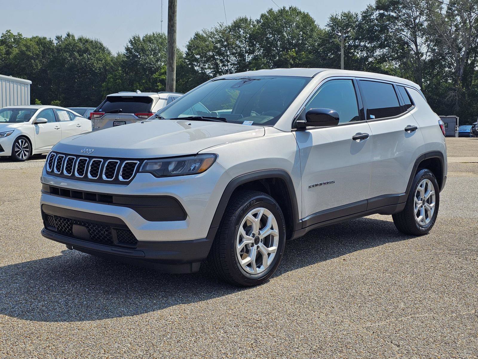Used 2025 Silver Zynith Metallic Clearcoat Jeep Sport image 1