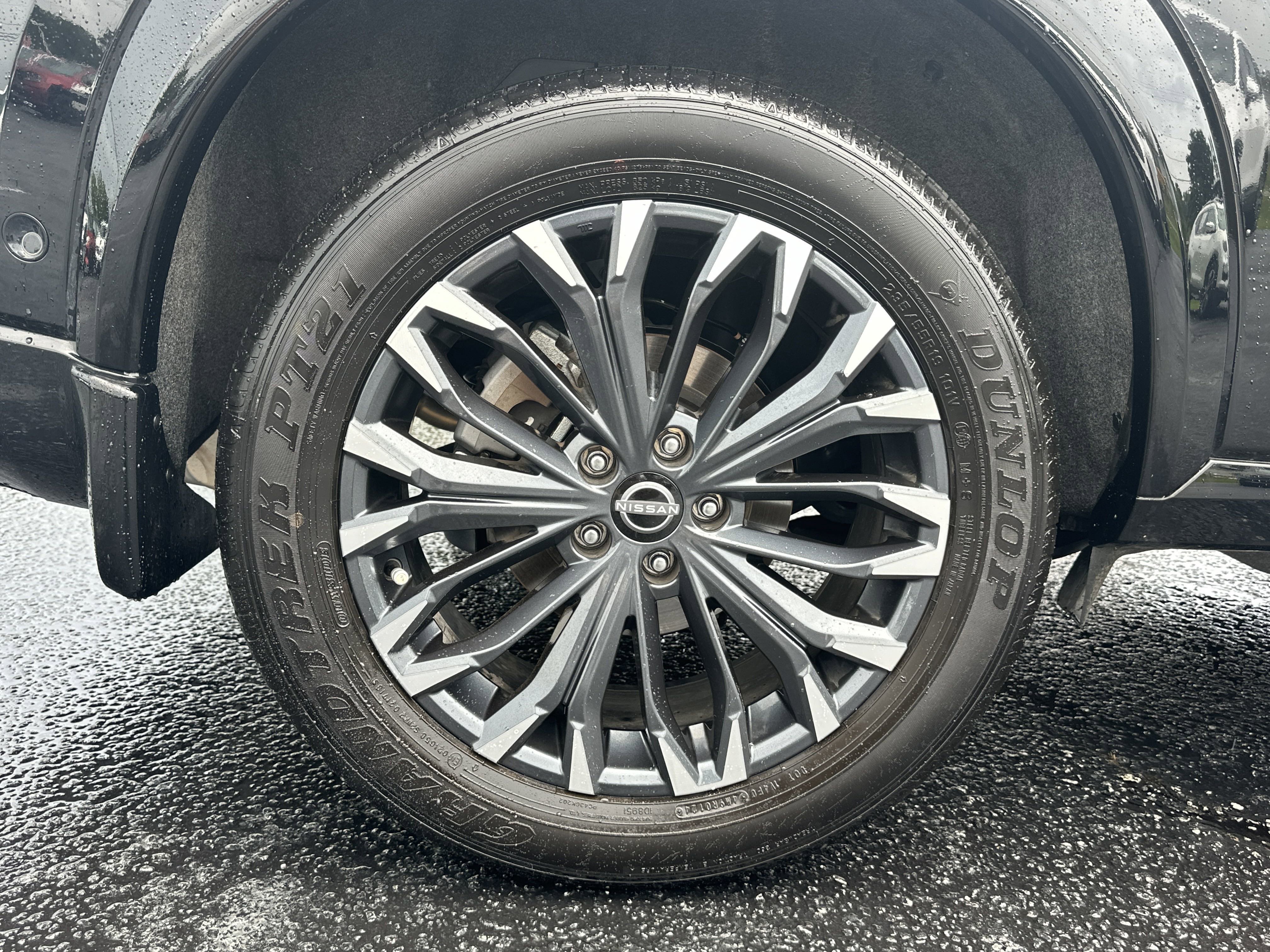 Used 2024 Super Black Nissan Platinum image 19