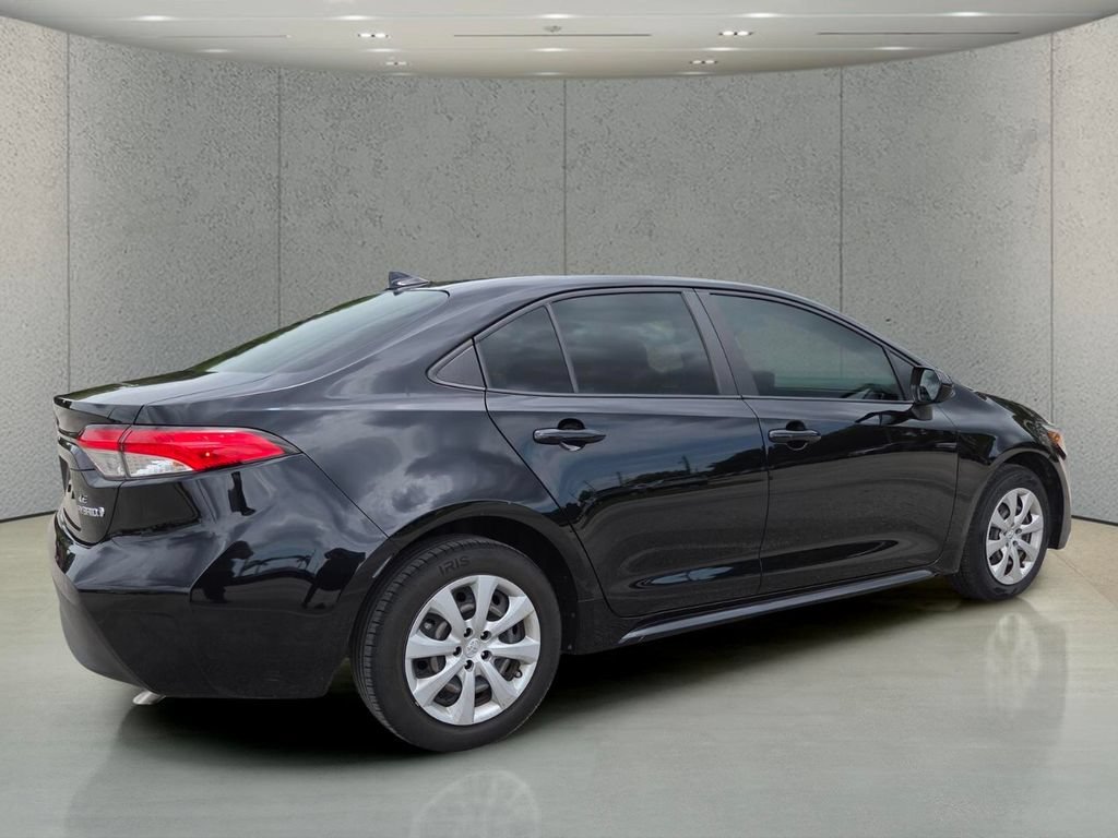 Used 2023 Midnight Black Metallic Toyota Hybrid LE image 4