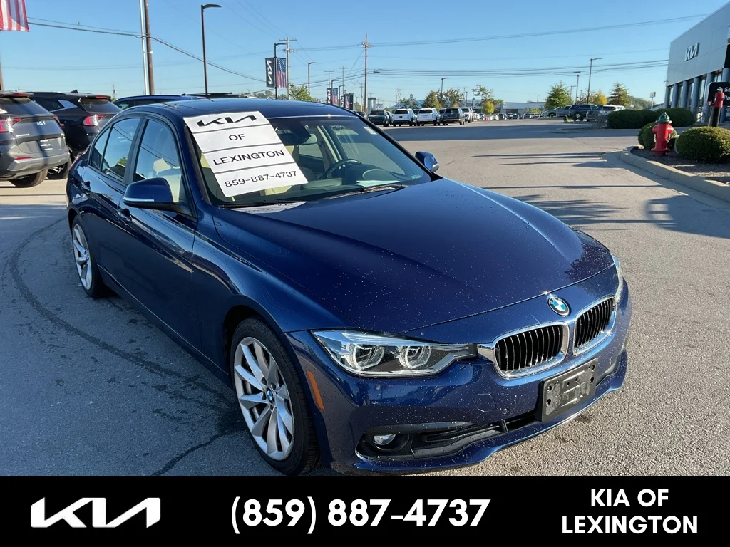 Used 2018 Mediterranean Blue Metallic BMW 320i xDrive image 1