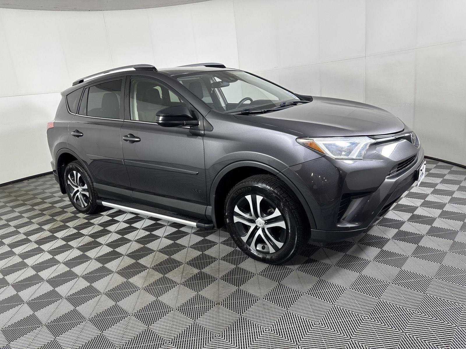 Used 2018 Magnetic Gray Metallic Toyota LE image 11