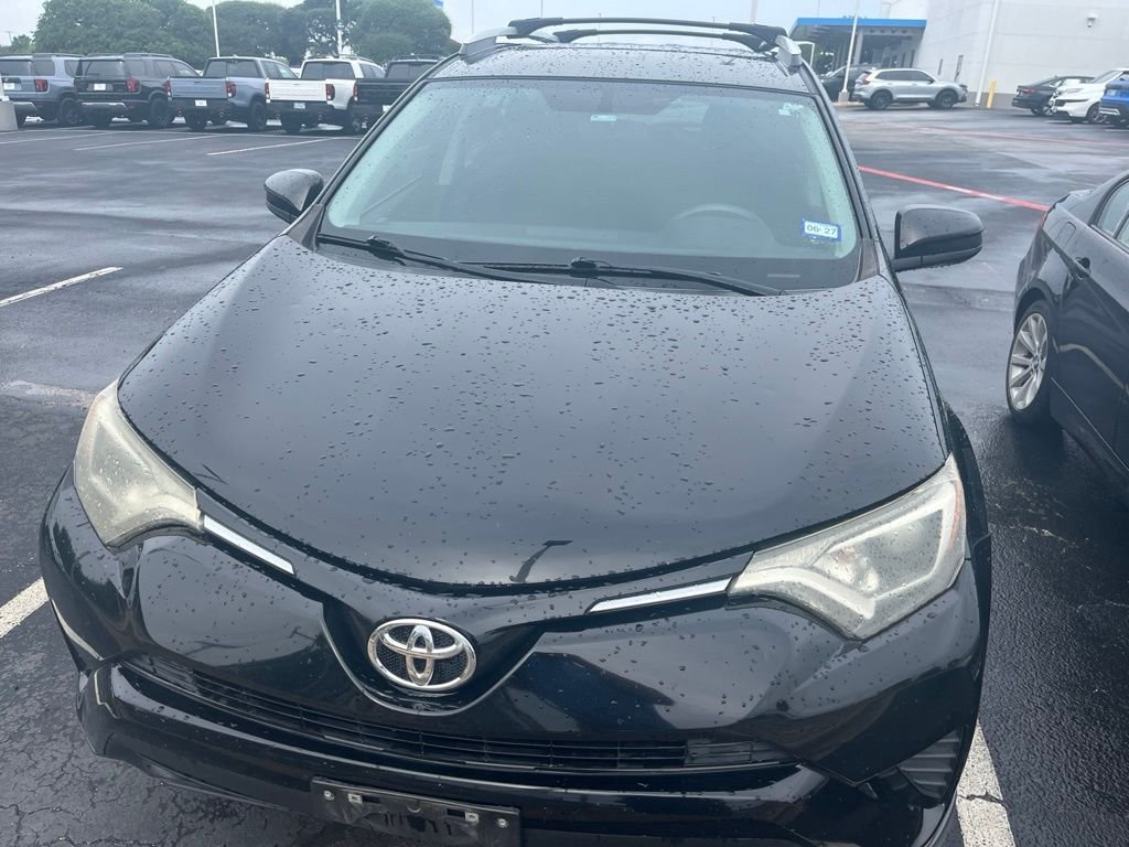 Used 2016 Black Toyota LE image 2