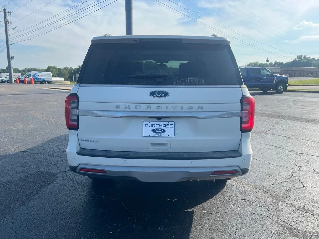 Used 2024 White Metallic Ford Limited image 4