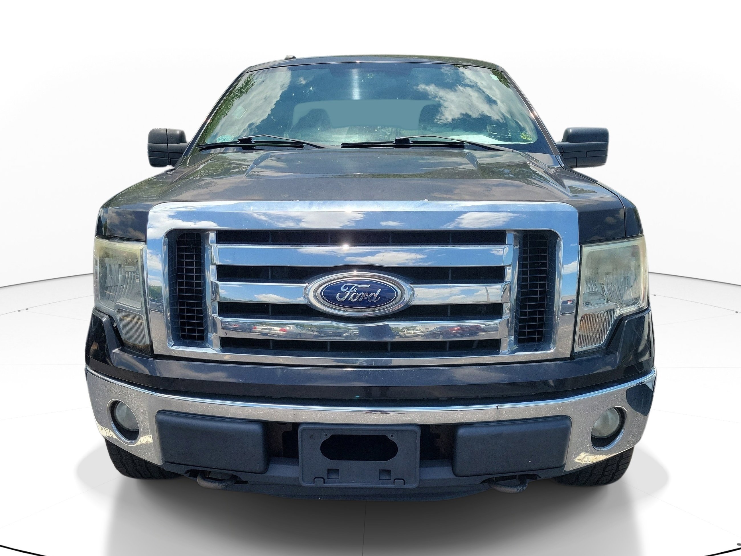 Used 2011 Tuxedo Black Metallic Ford XLT image 1