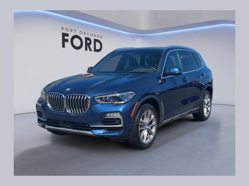 Used 2021 Blue BMW xDrive40i image 1