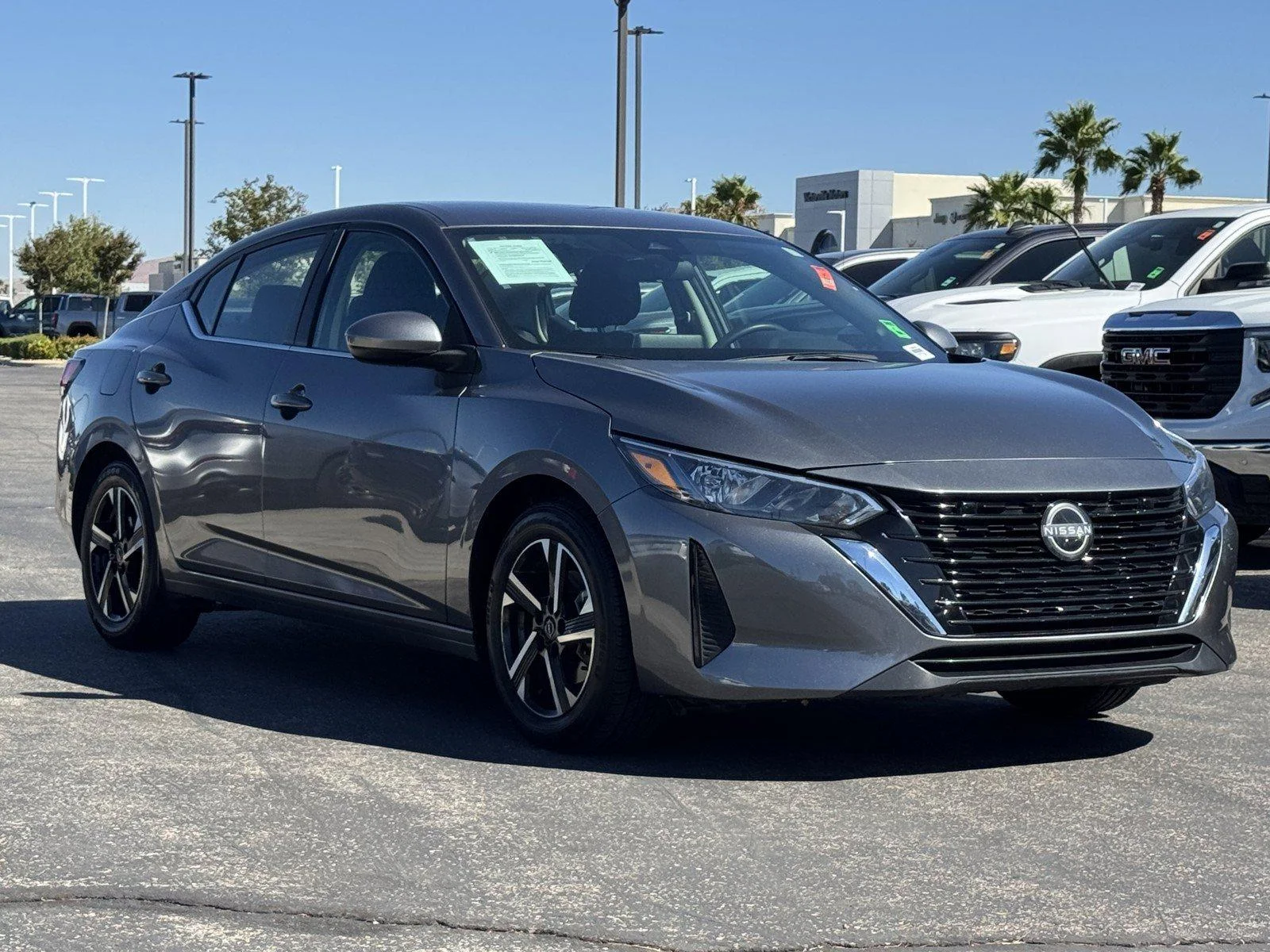 Used 2024 Gun Metallic Nissan SV image 1
