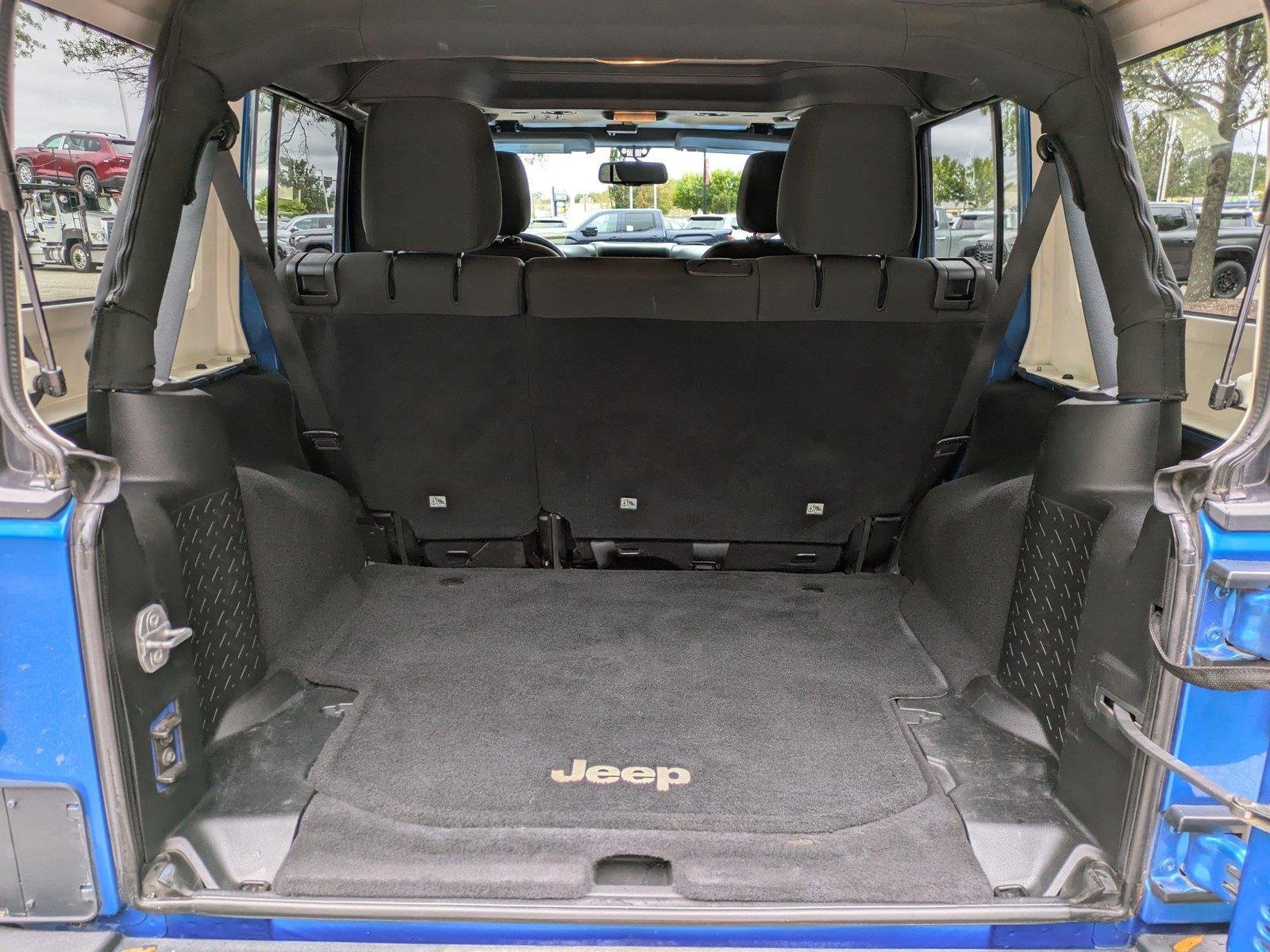 Used 2015 Hydro Blue Pearl Coat Jeep Sport image 13