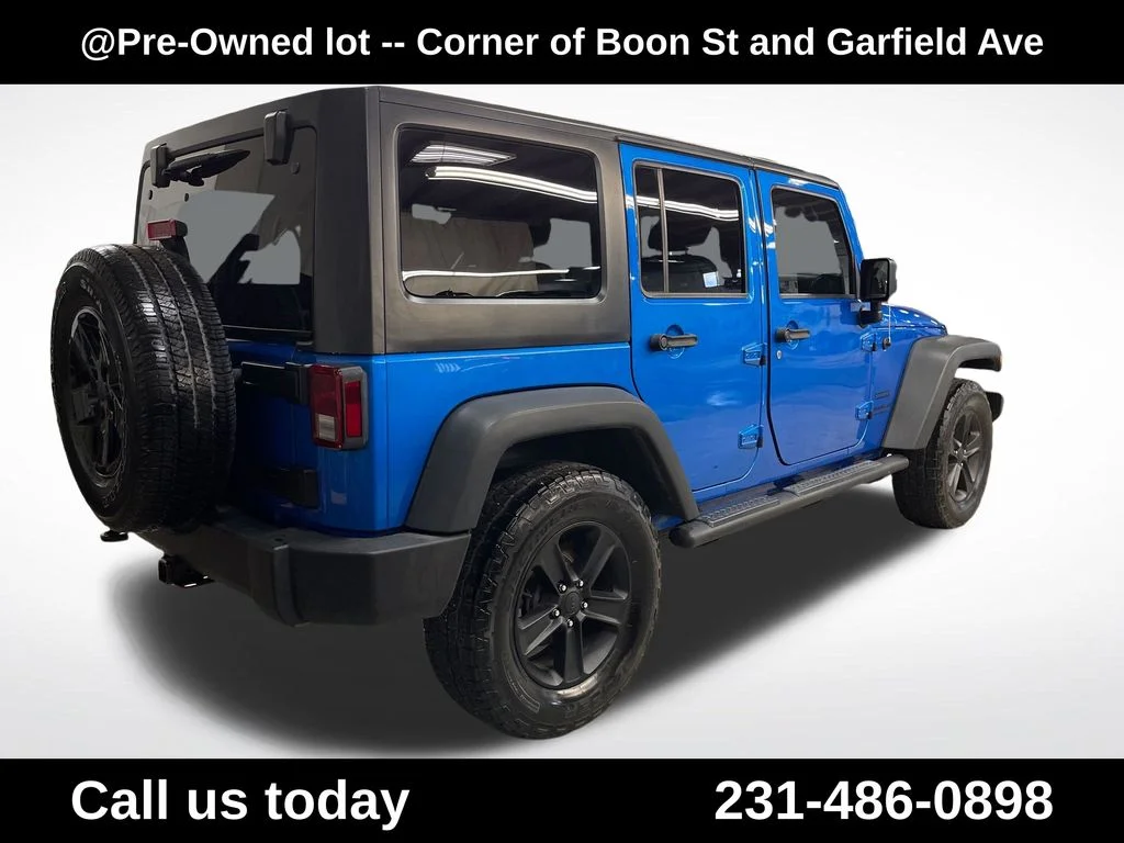 Used 2016 Blue Jeep Unlimited Sport image 10
