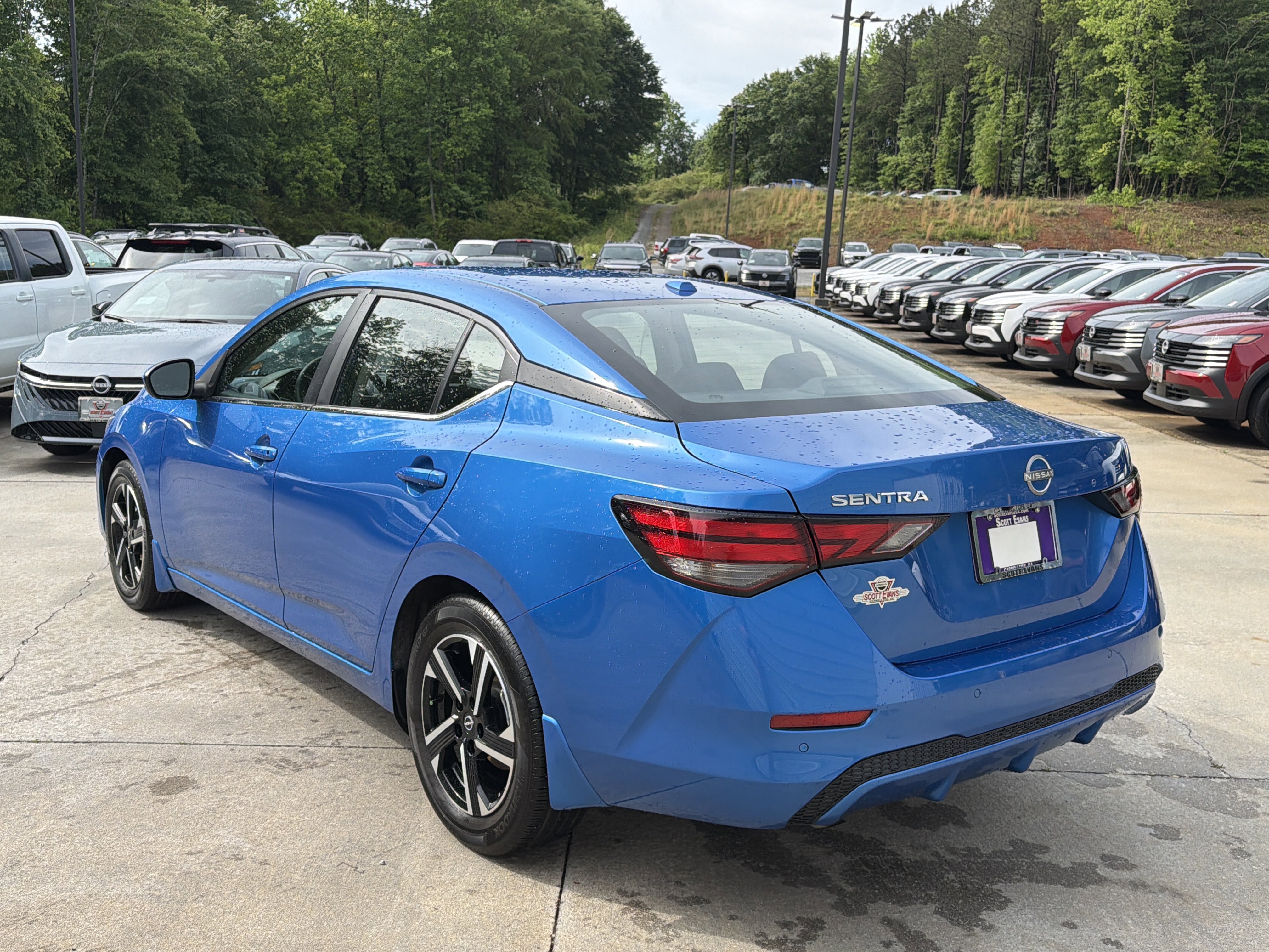 Used 2025 Electric Blue Metallic Nissan SV image 6