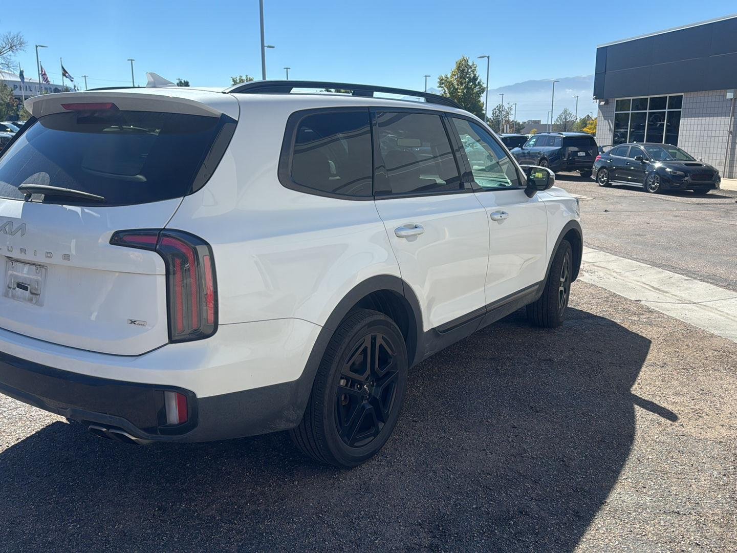 Used 2024 Glacial White Pearl Kia EX X-Line image 4