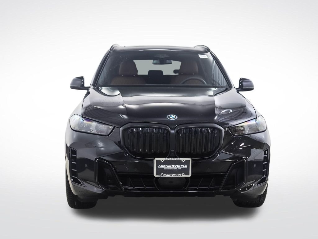 New 2026 Black Sapphire Metallic BMW xDrive50e image 8
