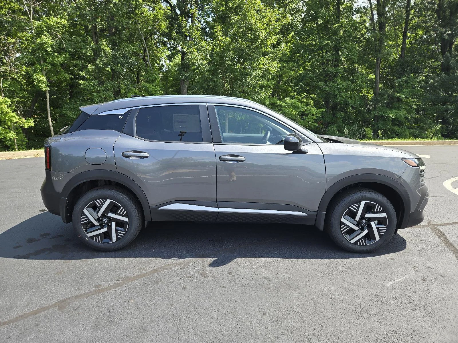 New 2026 Gun Metallic Nissan SV image 2