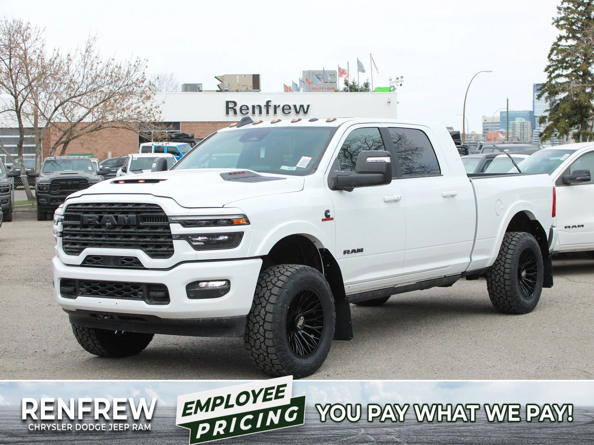 New 2026 White RAM Limited* Mega Cab, 2 Inch Lift, 35 Inch Tires, Trigger Industries Mudflaps image 1