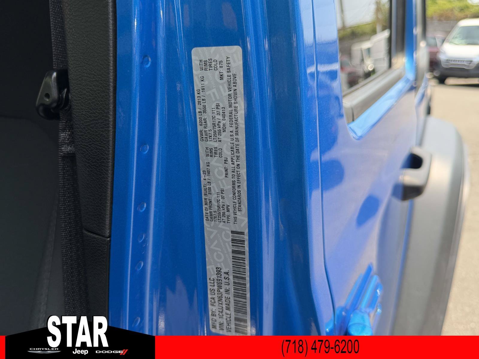 Used 2023 Hydro Blue Pearlcoat Jeep Willys image 18