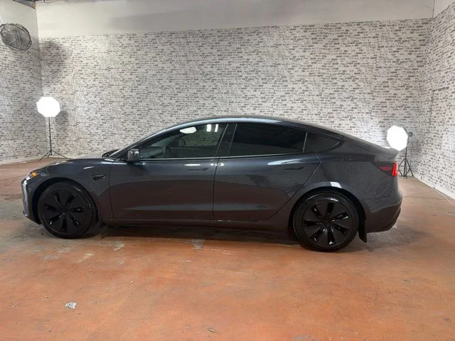 Used 2025 Stealth Gray Tesla  image 4