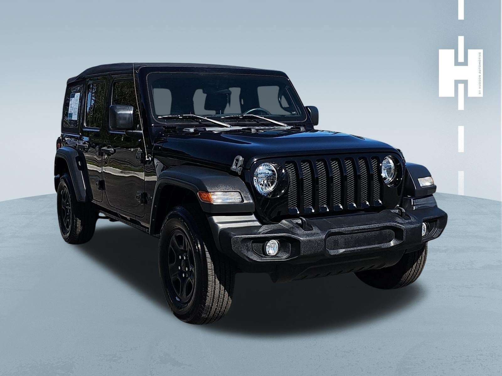 Used 2023 Black Clearcoat Jeep Sport image 1