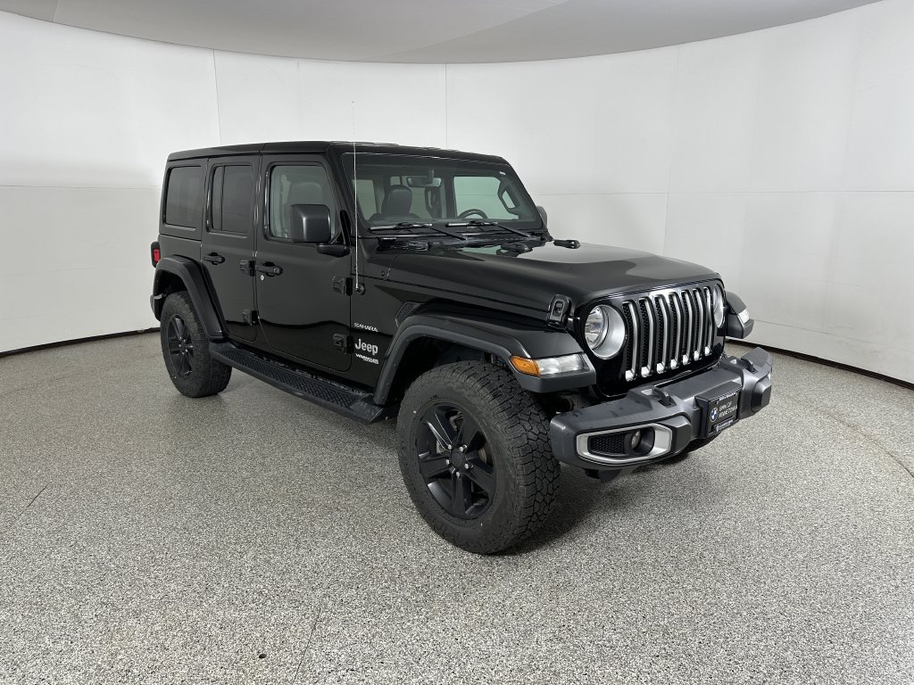 Used 2018 Black Jeep Unlimited Sahara image 4