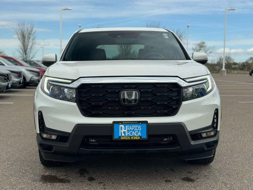 Used 2023 Honda Passport EX-L with VIN 5FNYF8H57PB031600 for sale in Coon Rapids, Minnesota