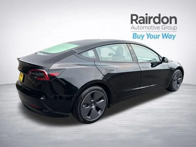 Used 2023 Solid Black Tesla Base image 7