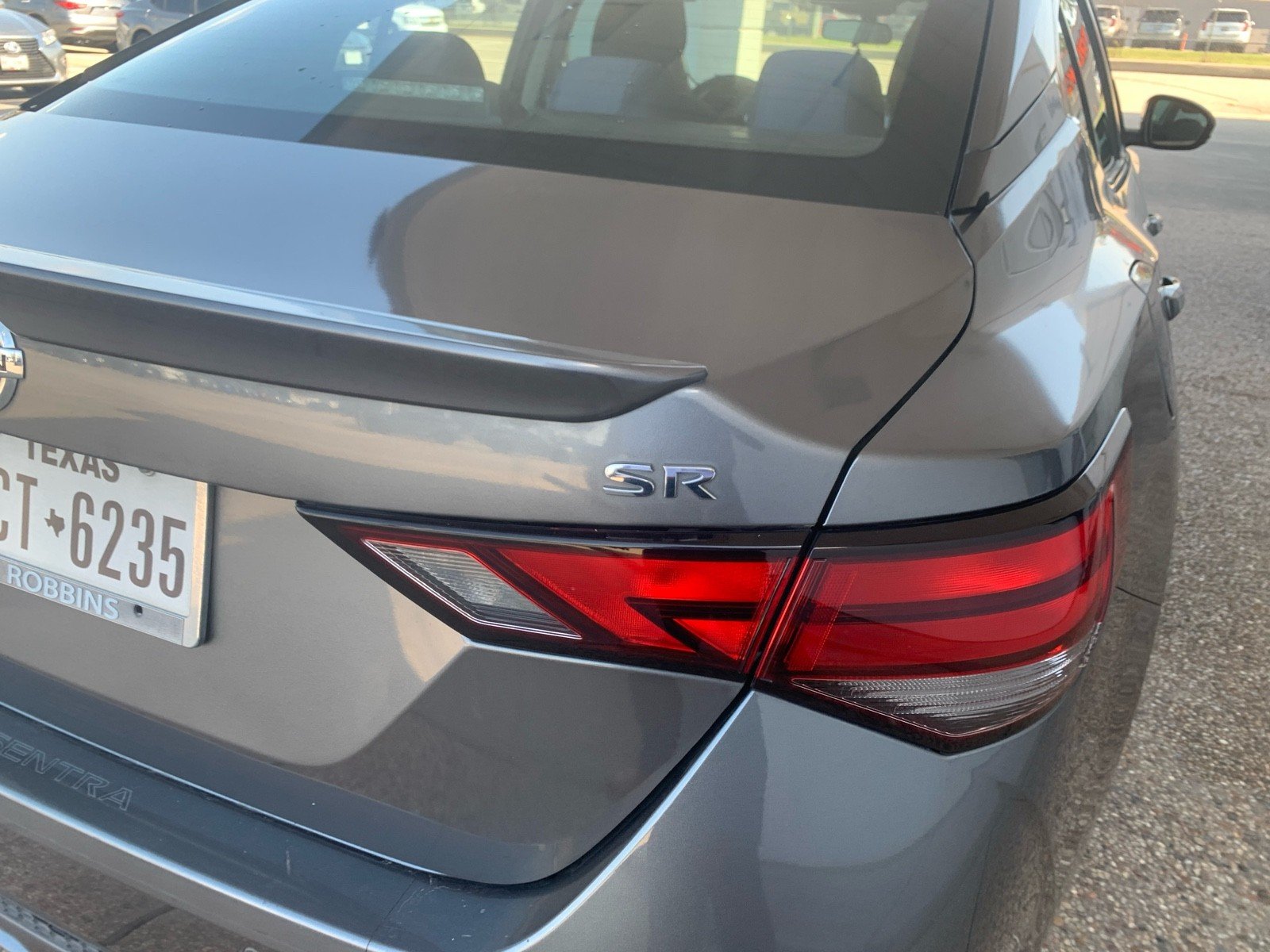 Used 2021 Gun Metallic Nissan SR image 2