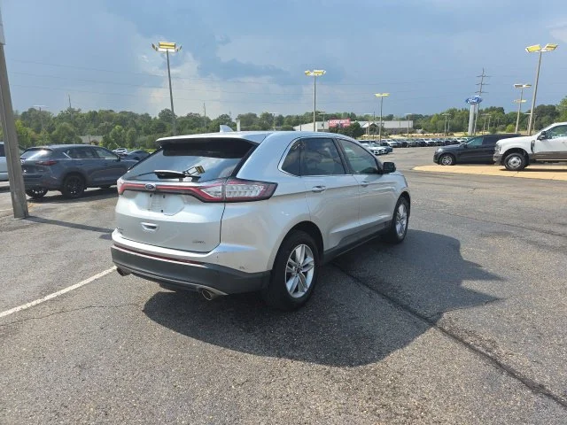 Used 2015 Ingot Silver Ford SEL image 3