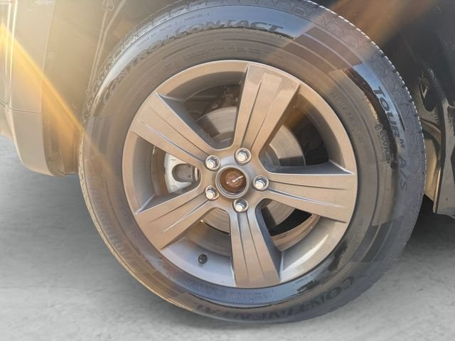 Used 2016 Granite Crystal Clearcoat Metallic Jeep Sport image 24