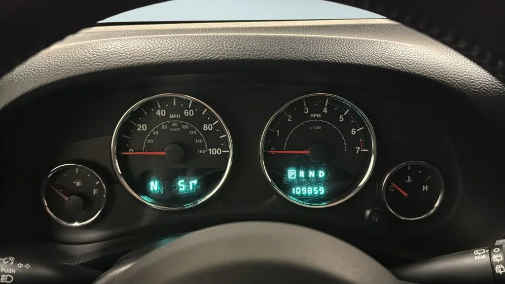 Used 2014 Orange Jeep Unlimited Sport image 19