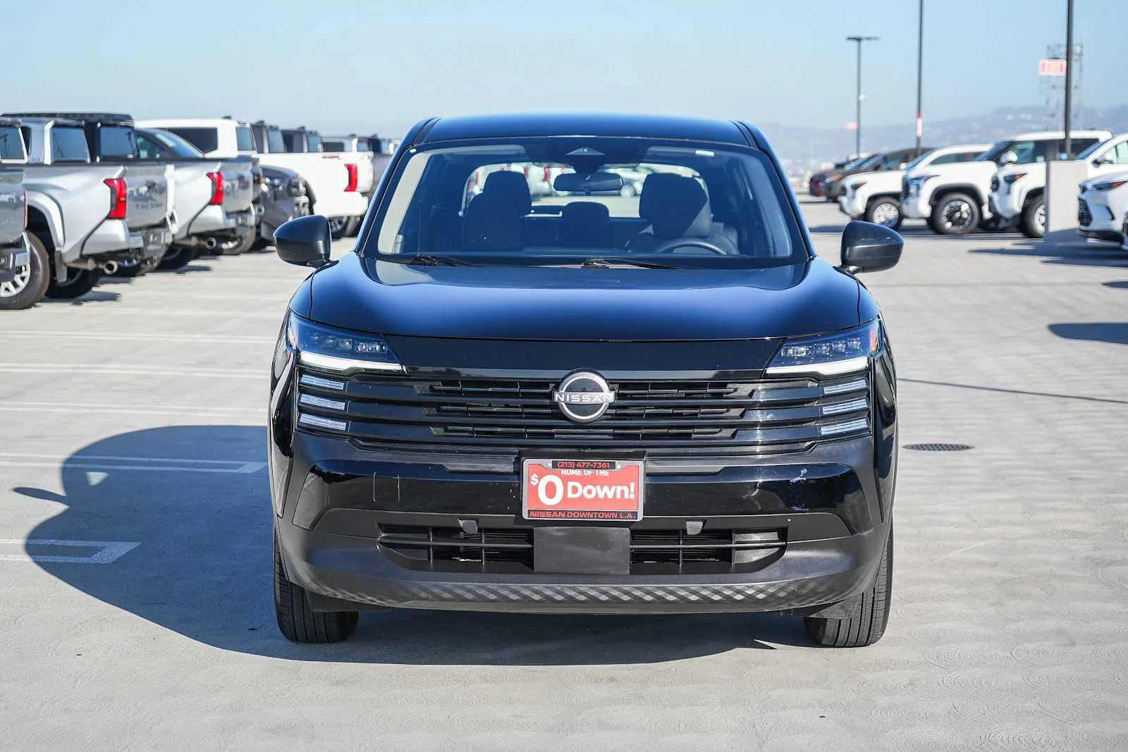 Used 2025 Super Black Nissan S image 2