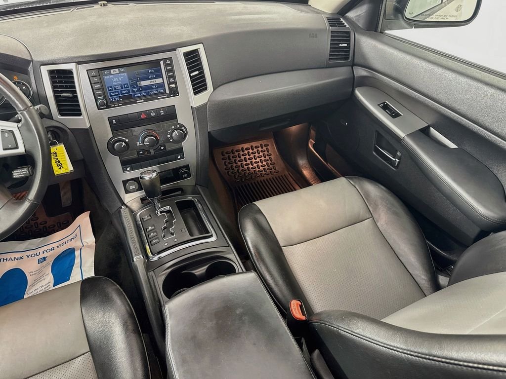 Used 2010 Light Graystone Pearlcoat Jeep Laredo image 28