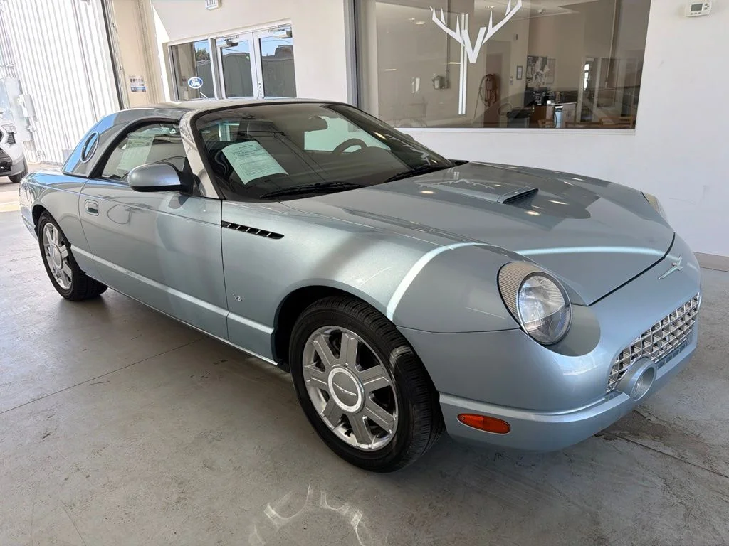 Used 2004 Light Ice Blue Metallic Ford Base image 1