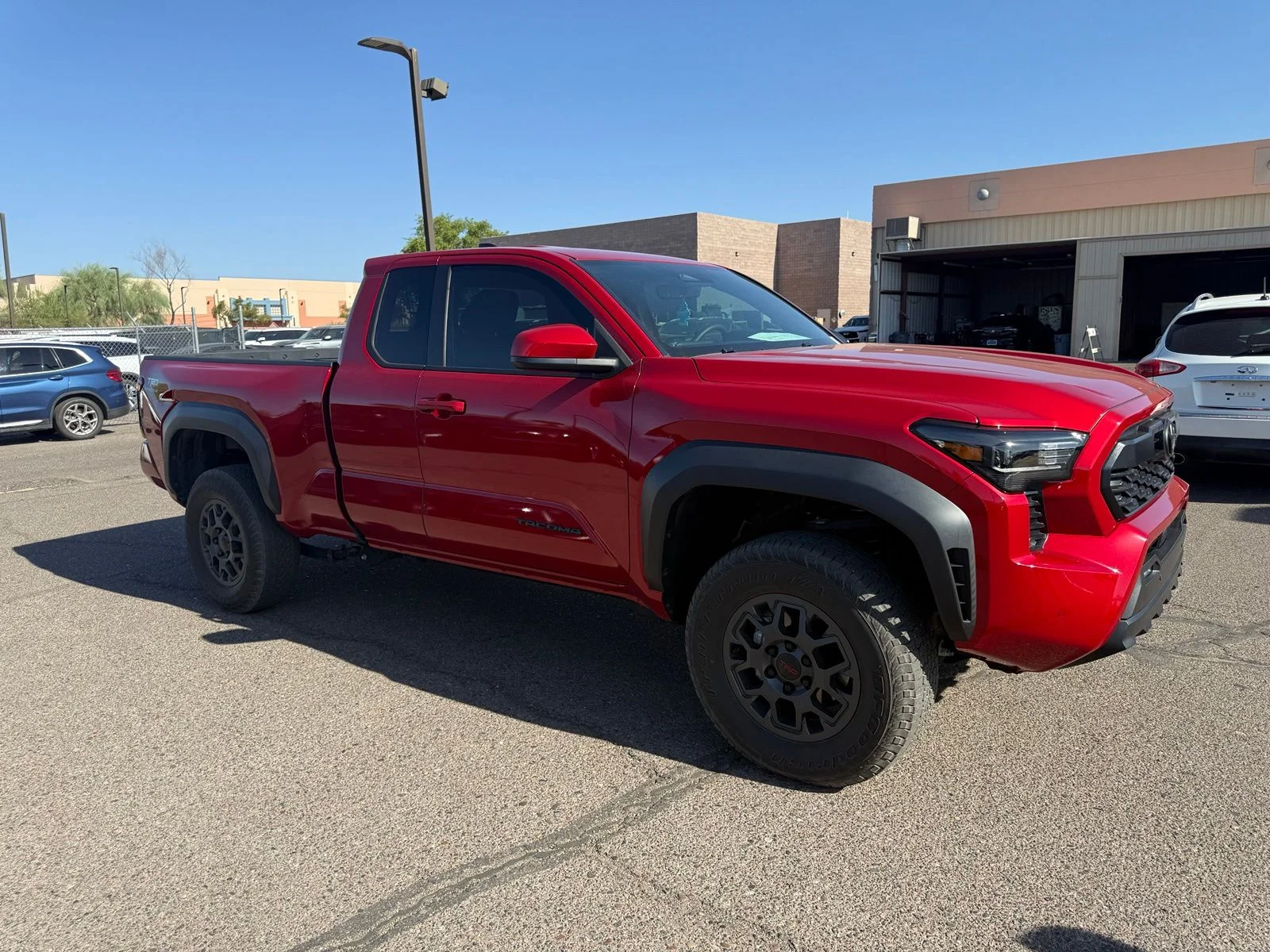 Used 2025 Supersonic Red Toyota Prerunner image 2