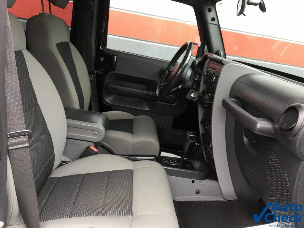 Used 2010 Black Jeep Unlimited Sport image 18