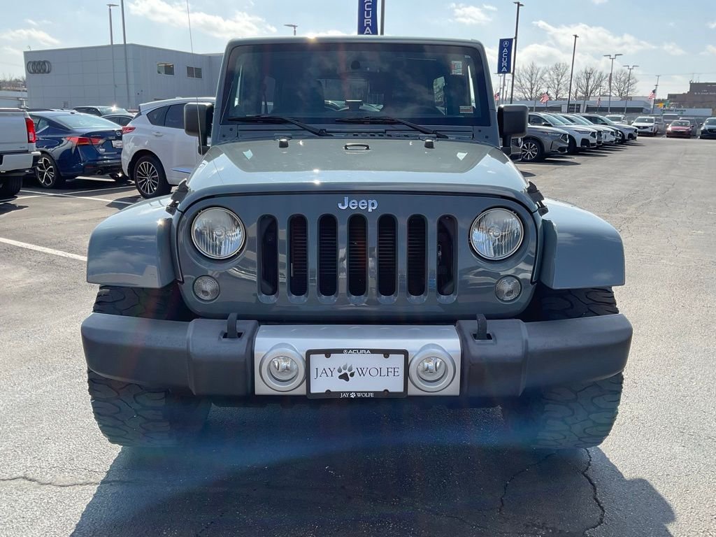 Used 2014 Jeep Wrangler Unlimited Sahara with VIN 1C4BJWEG2EL203508 for sale in Kansas City