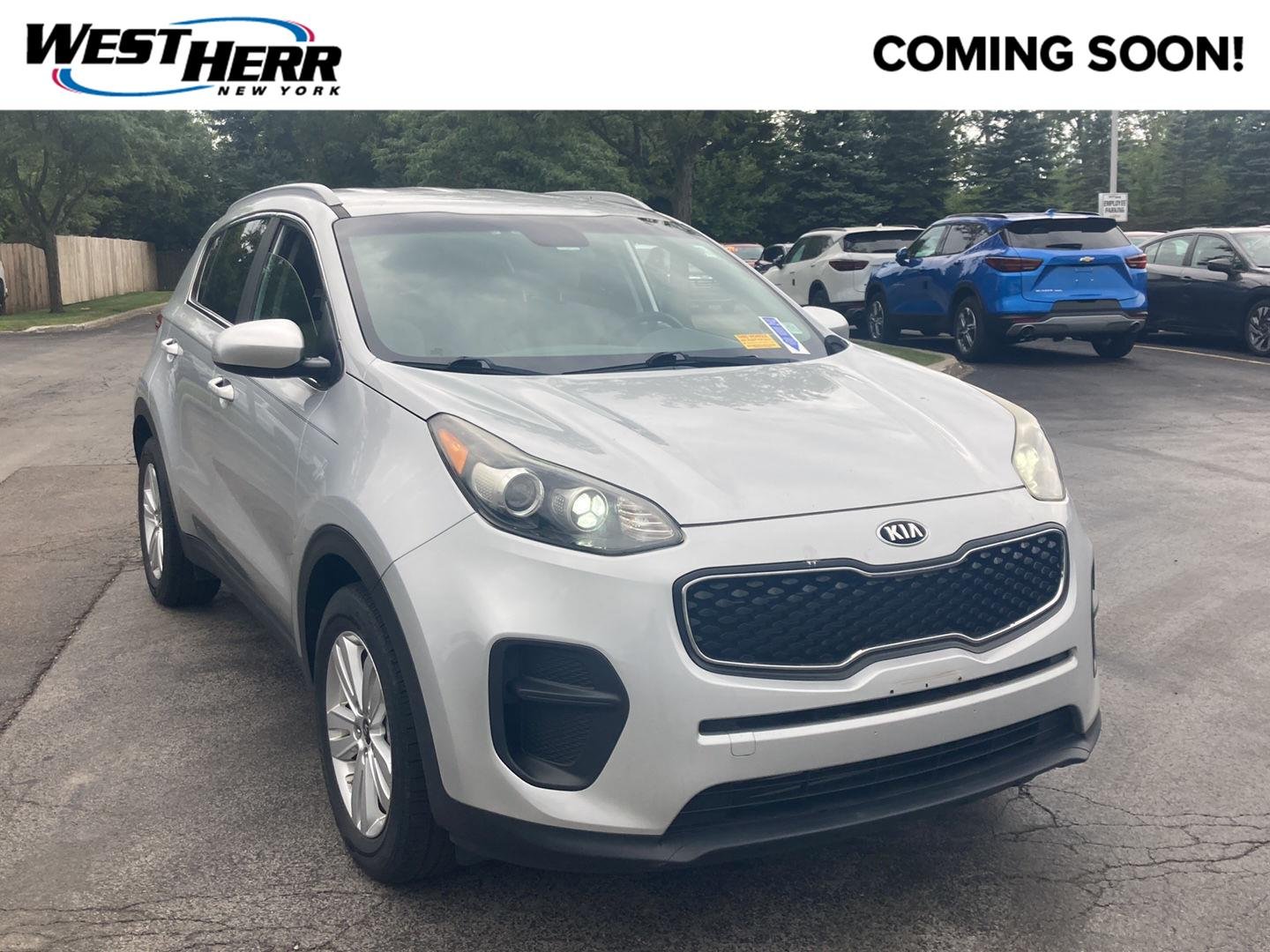 Used 2019 Sparkling Silver Kia LX image 1