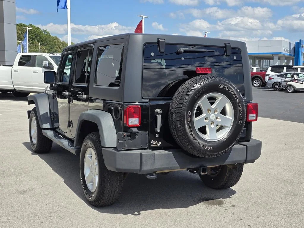 Used 2014 Black Clearcoat Jeep Sport image 8