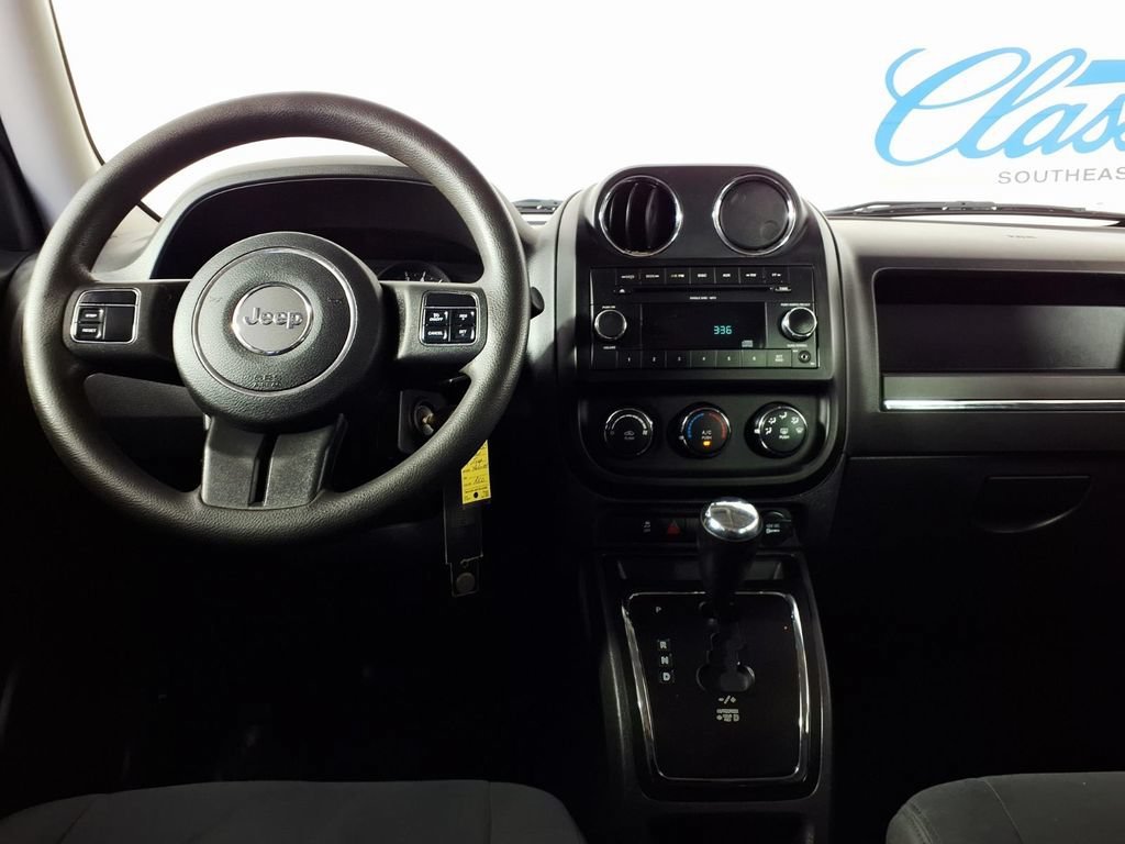 Used 2011 Deep Cherry Red Jeep Sport image 15