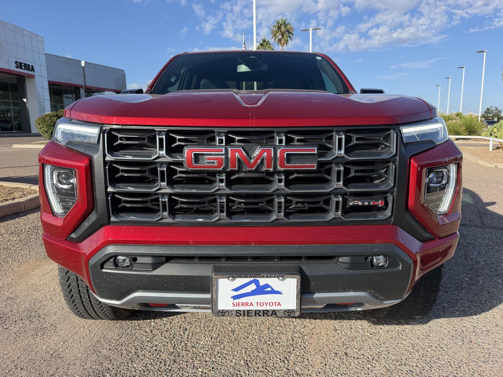 Used 2025 Volcanic Red Tintcoat GMC 4WD AT4 image 10
