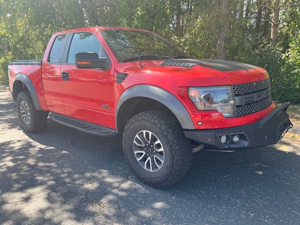 Used 2013 Red Ford SVT Raptor image 1