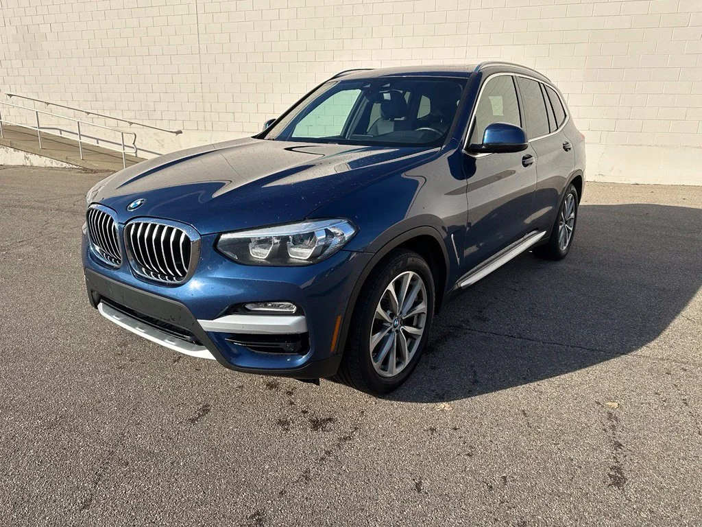 Used 2019 Blue Metallic BMW xDrive30i image 1