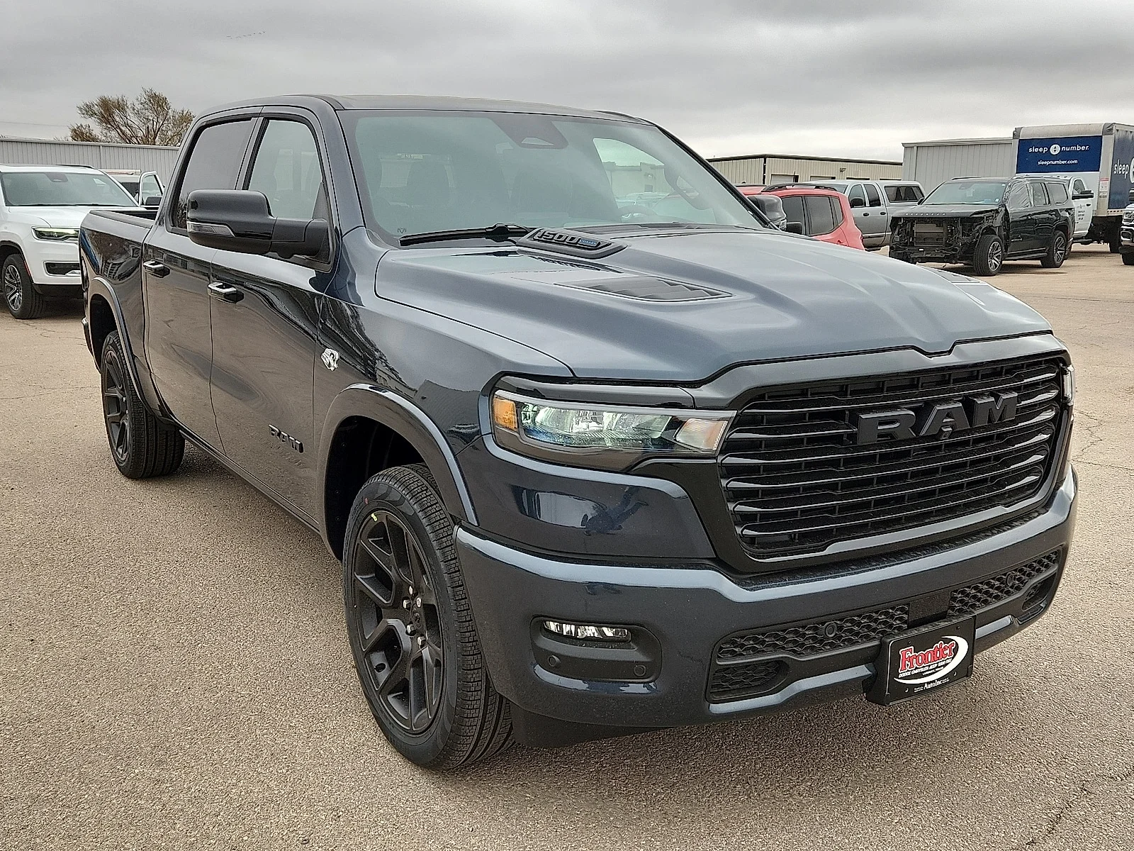 New 2026 Forged Blue Metallic  Paint Ram LARAMIE CREW CAB 4X4 5