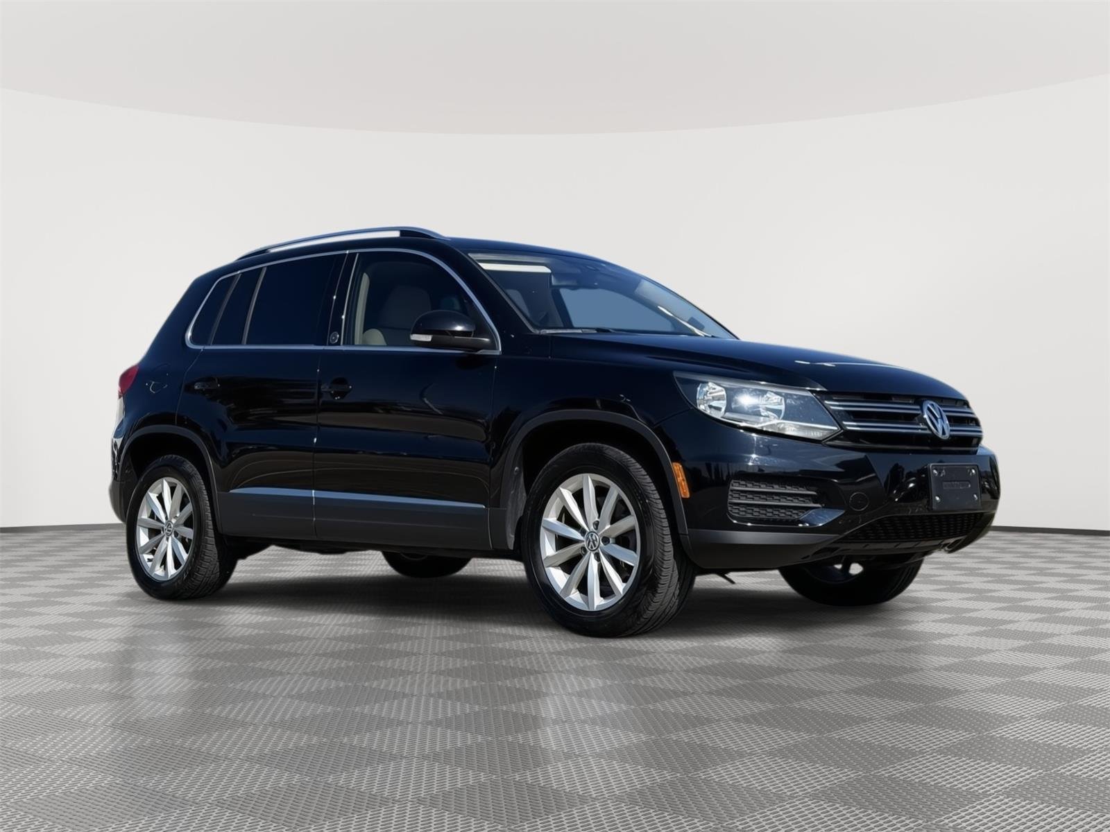 Used 2017 Deep Black Pearl Volkswagen Wolfsburg Edition image 1