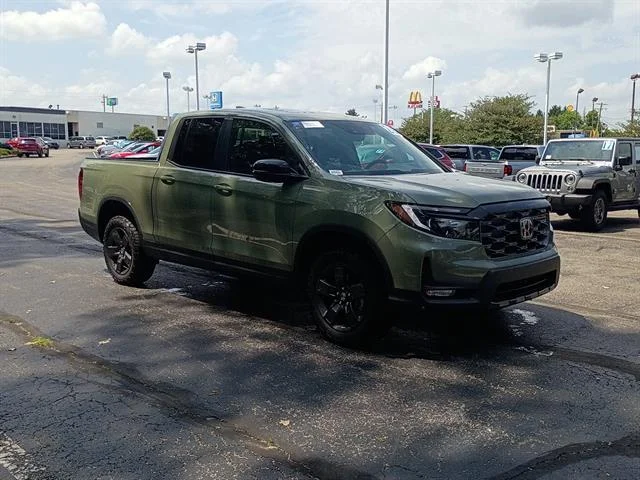 Certified Used 2026 Ash Green Metallic Honda TrailSport image 1