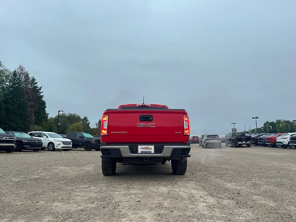 Used 2016 CARDINAL RED GMC 4WD SLE image 8