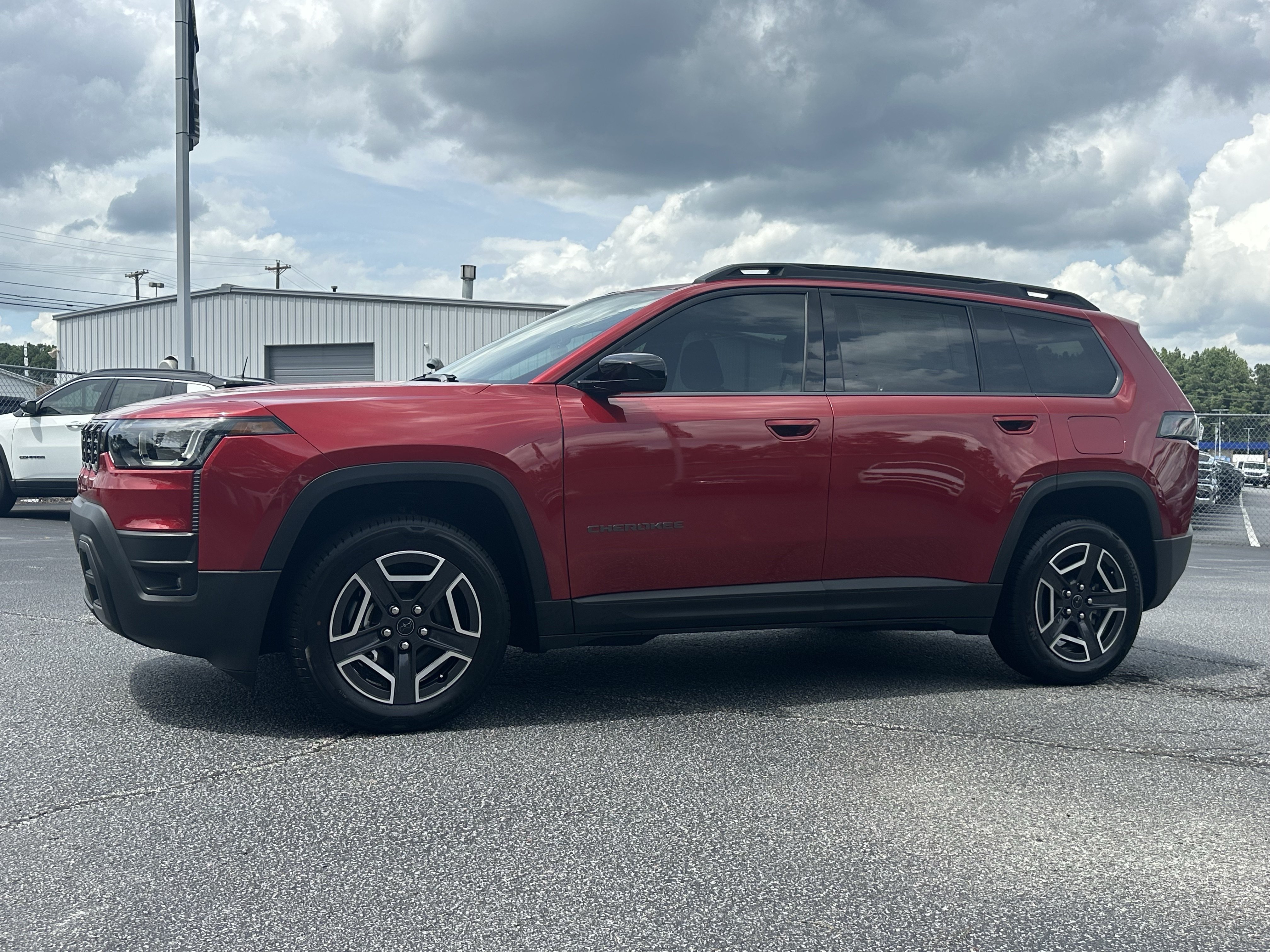 New 2026 Red Hot Pearlcoat Jeep Laredo image 4