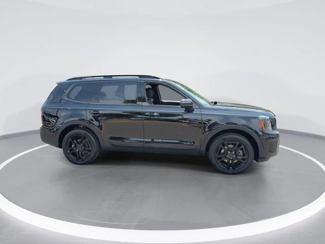 Used 2025 Black Kia EX X-Line image 2
