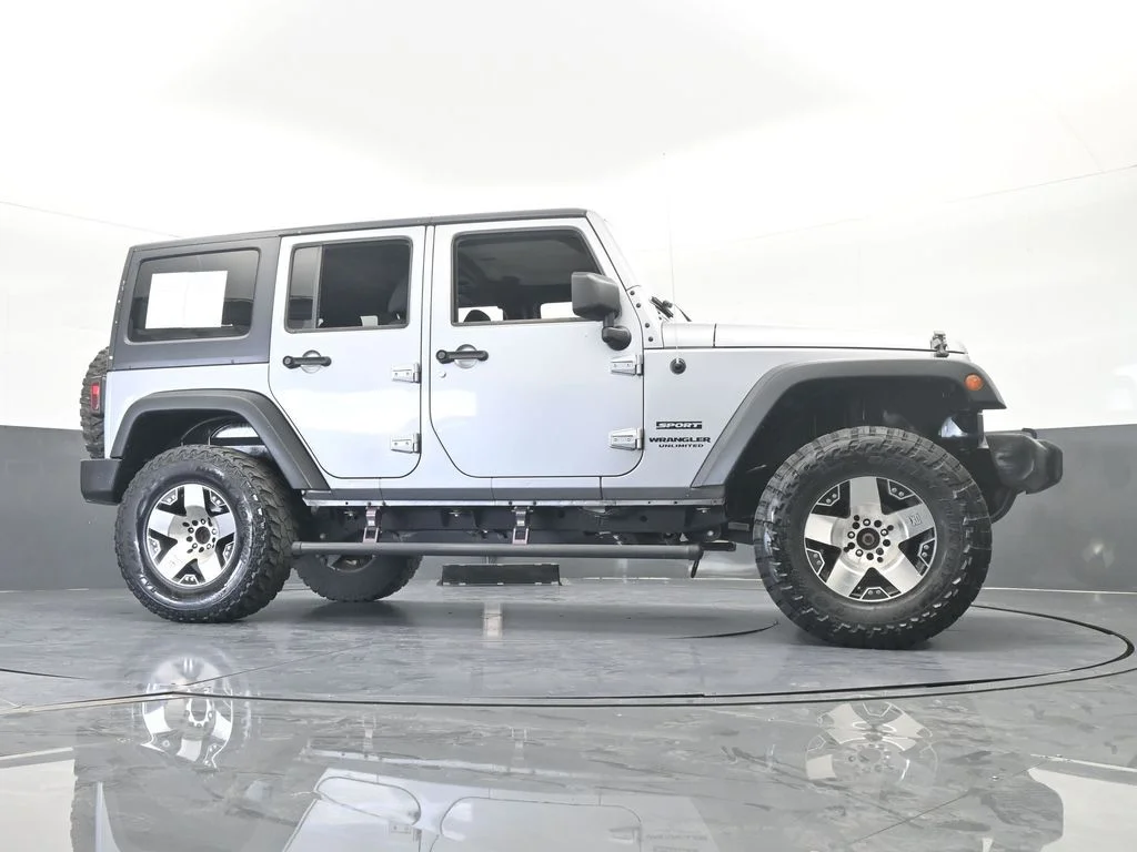 Used 2016 Billet Silver Metallic Clearcoat Jeep Unlimited Sport image 52