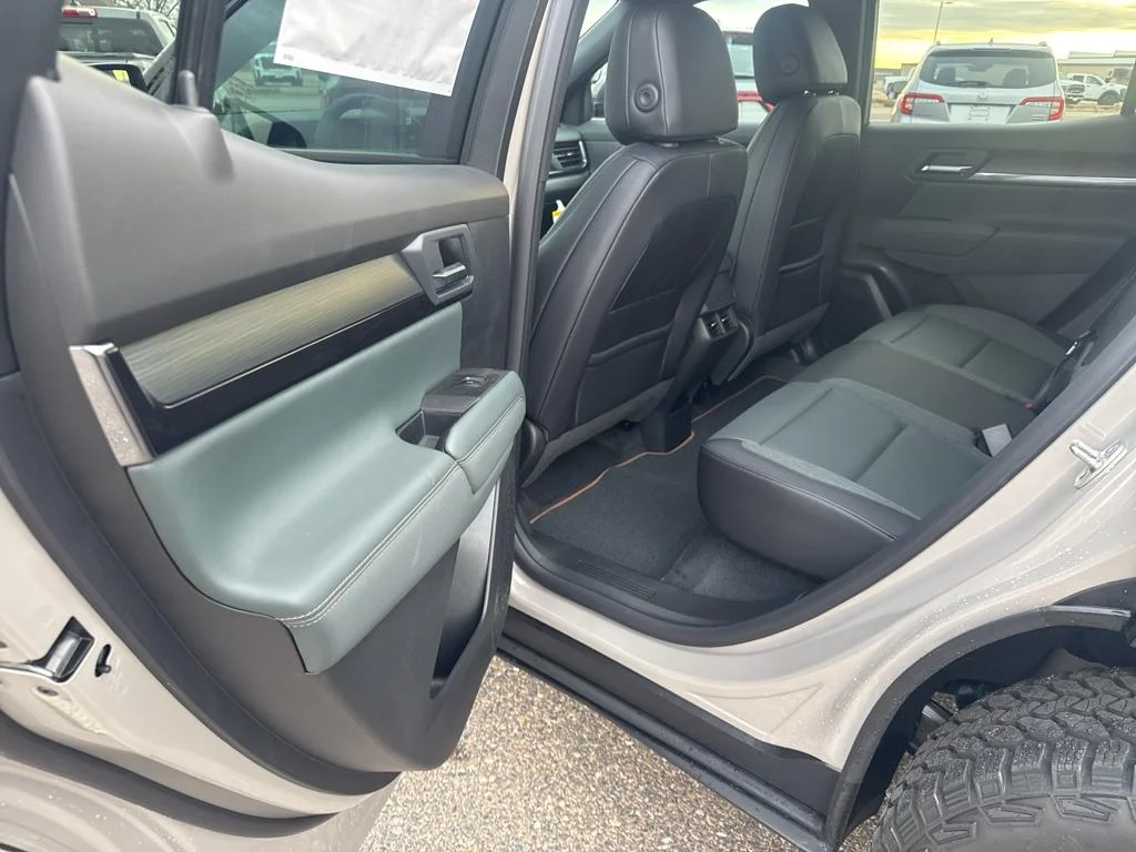 New 2026 Riverstone Metallic GMC AT4 image 13