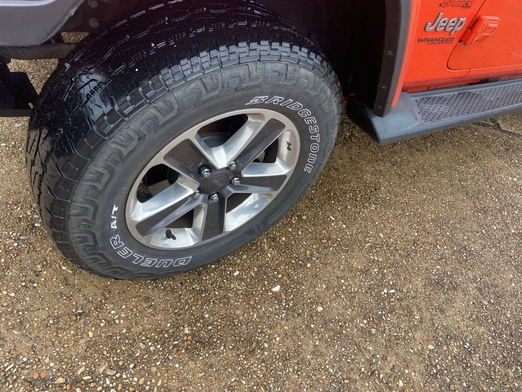Used 2019 Orange Jeep Unlimited Sahara image 24